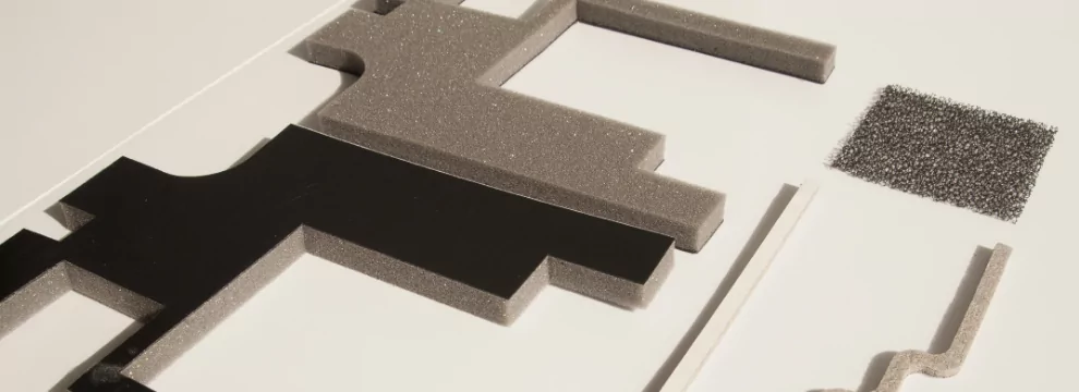 A white table with various foam decals.