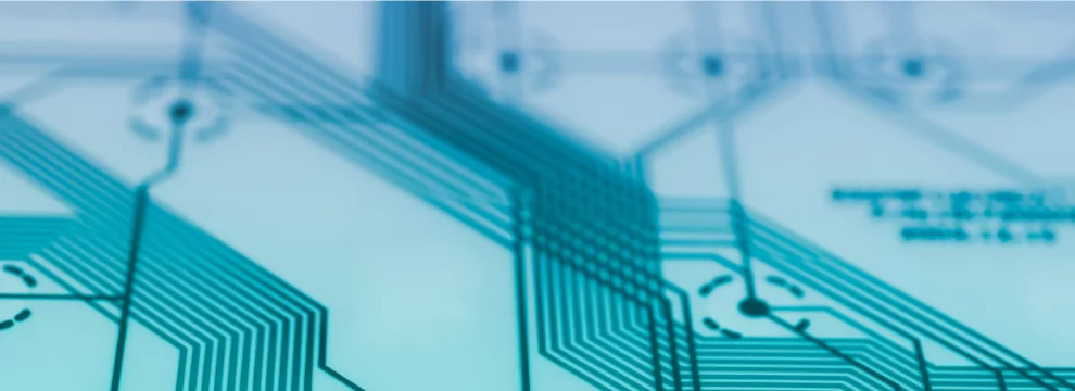 A close up of a custom electronic circuit board.