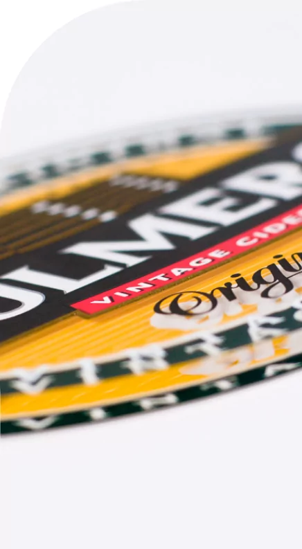 A close up of a high quality label with a logo on it.